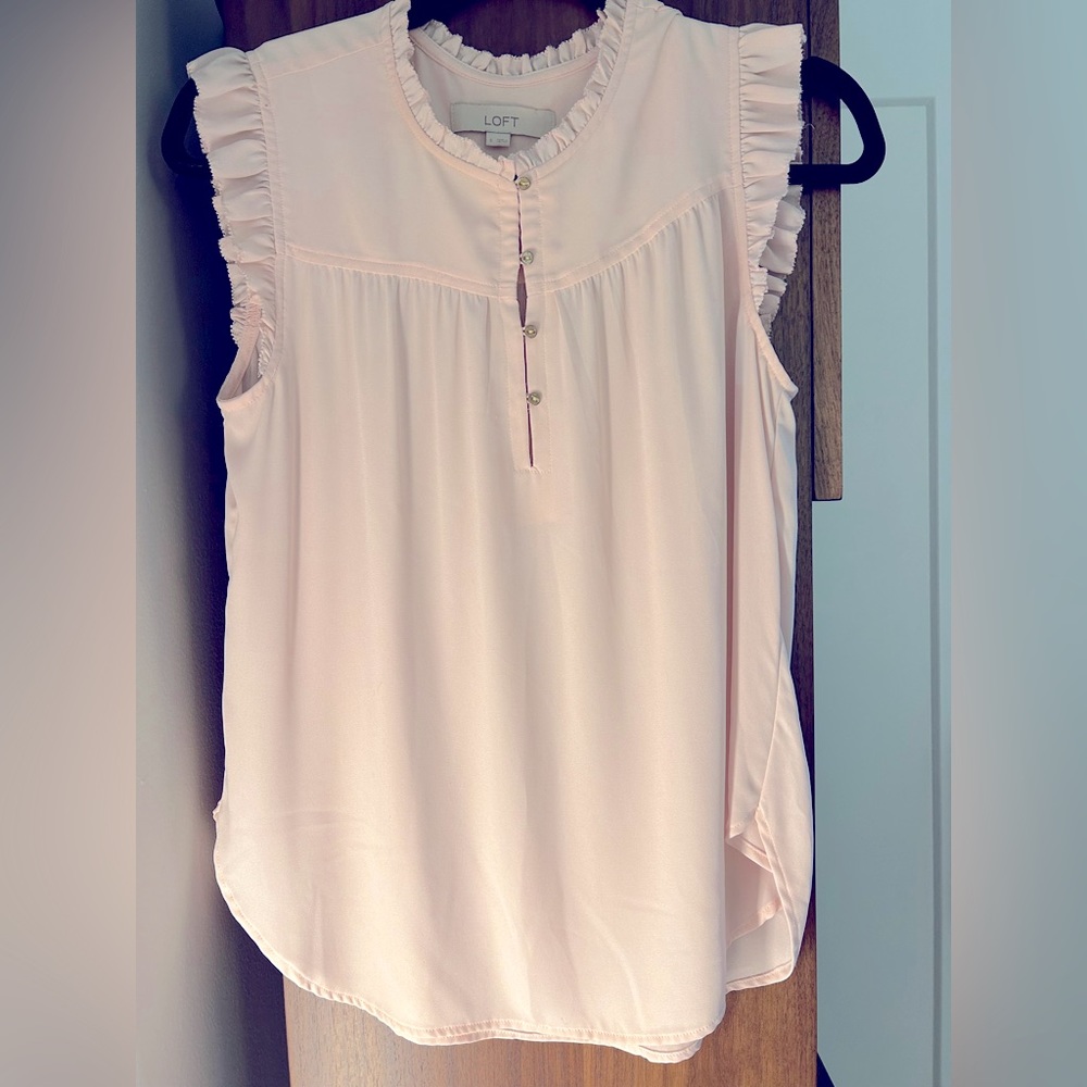 Light pink sleeveless blouse